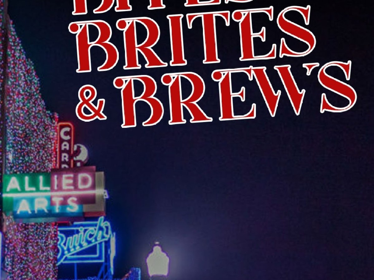 Neon signs with text 'Bites, Brites & Brews' against a dark background.